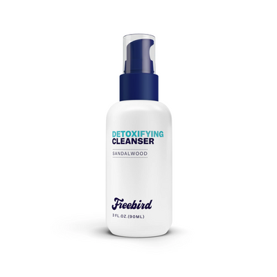 White 3 fl. oz. Freebird Detoxifying Bald Head Cleanser bottle with navy blue pump and cap, sandalwood scent.