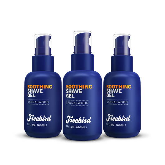 Three bottles of Freebirds Soothing Shave Gel, sandalwood-scented and blue, on a white background.
